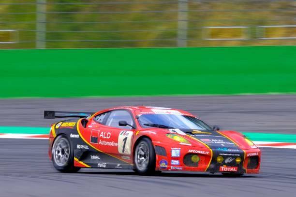 Ferrari F430 GT "Spa, Belgium - August 1, 2010: AF Corse Ferrari F430 racing on the track of Spa Francorchamps during the 2010 24 hours of Spa." ferrari ferrari f430 italian culture action stock pictures, royalty-free photos & images