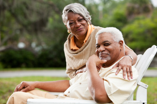 Portrait of stylish senior African American couple.  Focus on man (60s).
