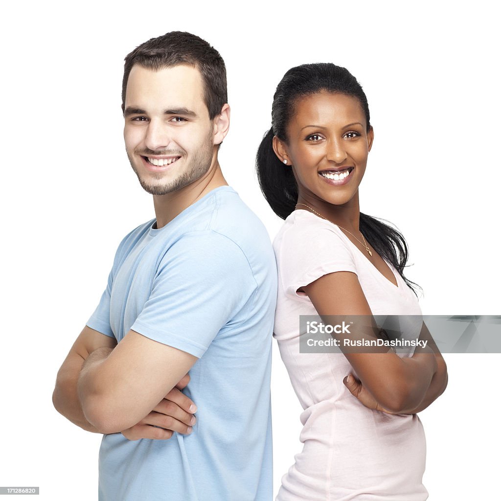 Smiling young student. Young happy student couple stand back to back White Background Stock Photo