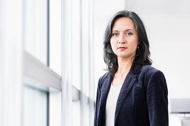 istock Serious Businesswoman At Window 171287139