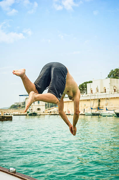 istock Man diving in the sea from a boat 171287583