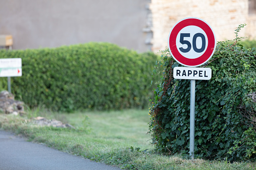 Road sign maximum speed limit 50, fixing speed by camera.