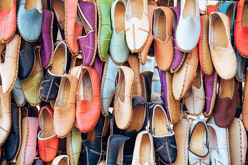 Traditional turkish leather shoes named yemeni. Colorful handmade leather slipper shoes displayed on the street market in Selcuk, Turkey.