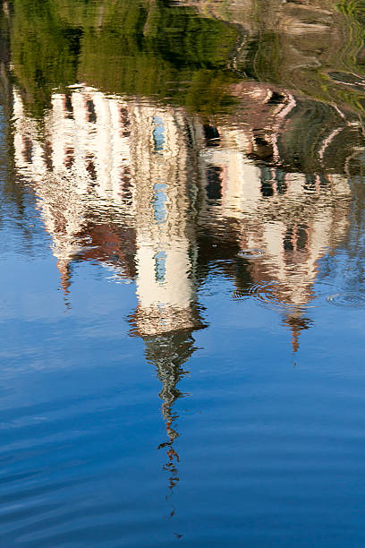 Beautiful Reflection "Beautiful reflection in the water. View to a beautiful building on the River Mulde, near the town Grimma, Saxony." grimma stock pictures, royalty-free photos & images