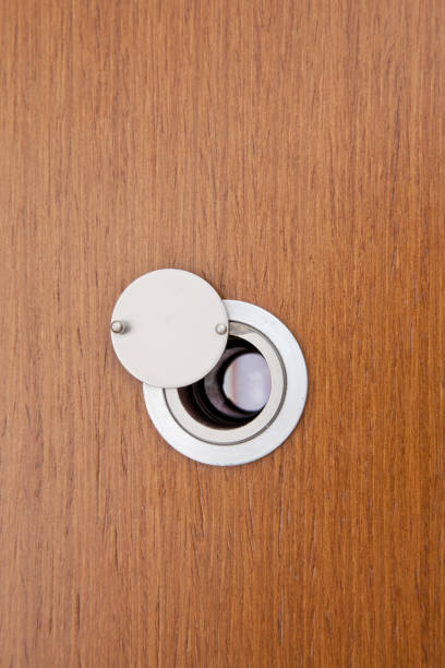 Peephole on wooden door