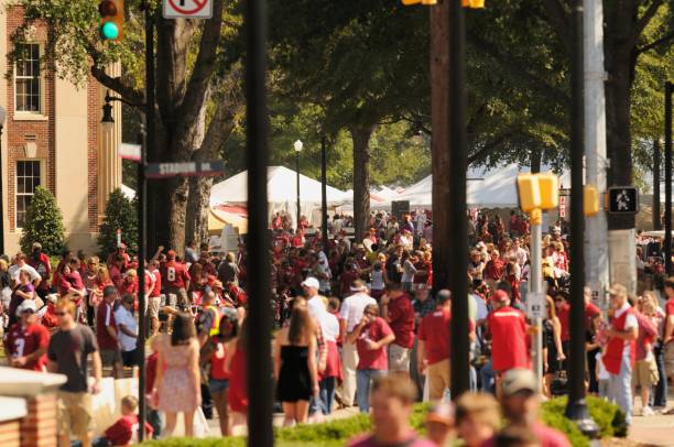 University of Alabama tailgating "Tuscaloosa, Alabama, USA - October 8, 2011: Tailgating fans around the 2011 Homecoming parade at The University of Alabama in Tuscaloosa.  Image taken near the quad and stadium during homecoming festivities on campus." tailgate party photos stock pictures, royalty-free photos & images