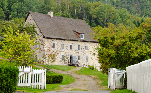 An old , and still working, flour mill constructed of stonein Baie Saint Paul
