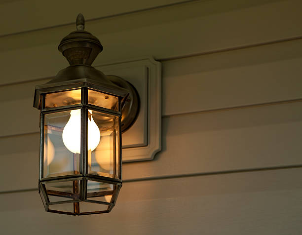 Porch Light at Night Night time shoot of a porch light. porch stock pictures, royalty-free photos & images