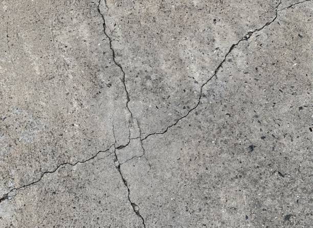 istock a cracked concrete floor with a crack. 1712897655