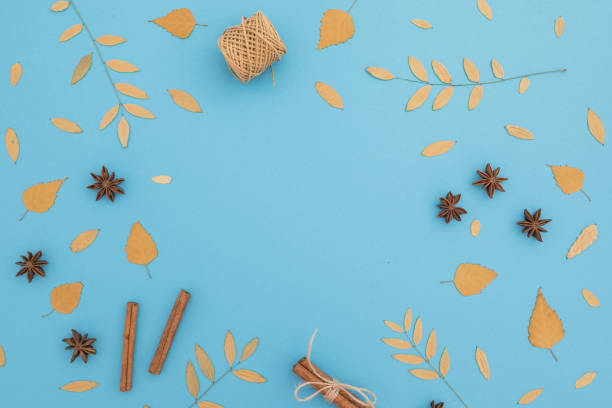 istock Autumnal frame composition made of fall leaves on blue background. Flat lay, top view. Thanksgiving day. 1712909238