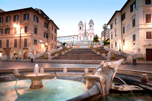 The Spanish Steps in Rome. In the foreground is the fountain called Fontana della Barcaccia 