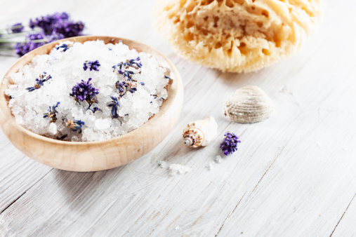 lavender bath salt for beauty treatment, on wooden background,  fresh summer feeling