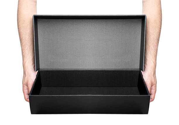 Hand hold open black box isolated on white background with clipping path