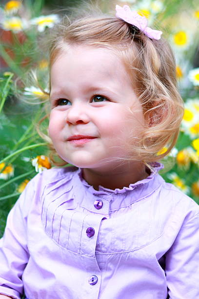 istock Litlle girl on meadow 171292011