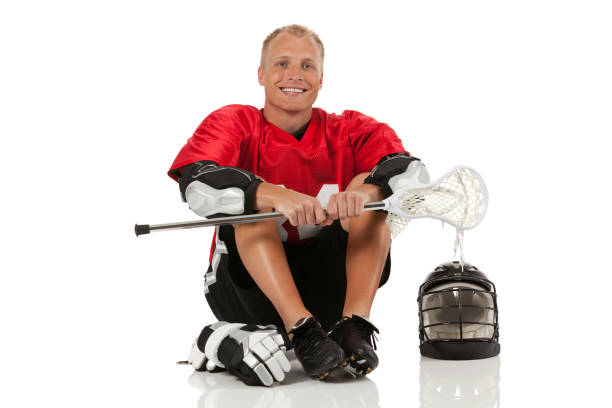 istock Happy lacrosse player sitting on the floor 171292031