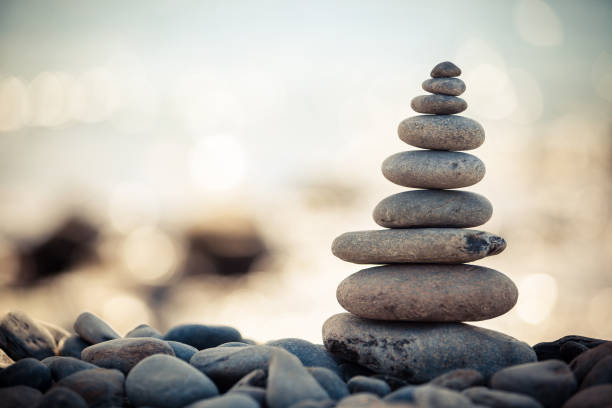 istock Stack of smooth stones over other stones on a beach 171292035