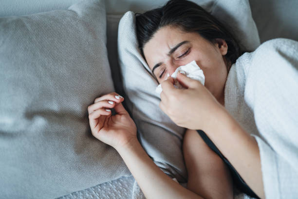 istock Runny nose and flu struggle. 1712920581