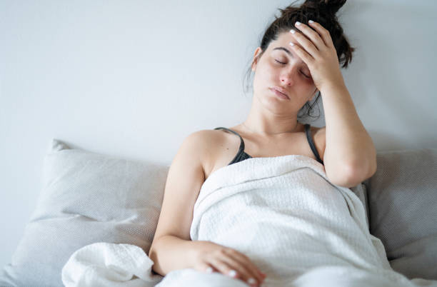 istock Young woman having a headache. 1712920609