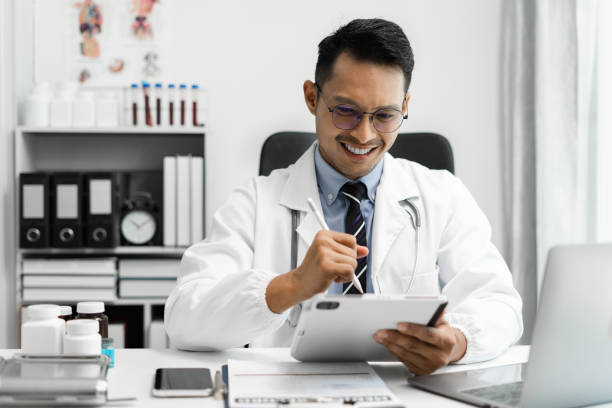 istock Doctor work on digital tablet healthcare doctor technology tablet using computer in a modern office  in the morning at the desk. 1712920724