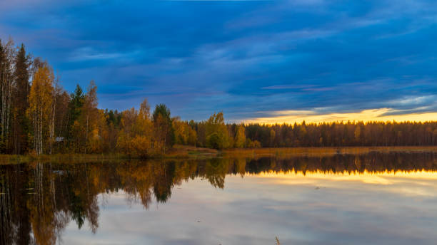 istock Sunset over autumn landscape 1712921322