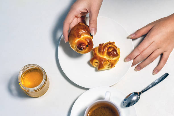 freshly baked buns with honey