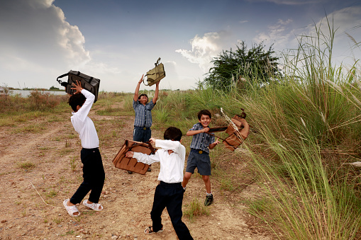 Panama City, March 2010. A contingent of undocumented workers picking tomatoes and straight beens in a file in Florida.