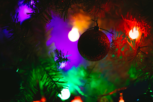 Christmas tree decorations at night. Close-up.