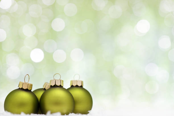 istock Green christmas baubles with illuminated background 171293281