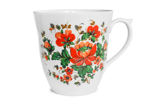 Vintage painted ceramic mug isolated on white background