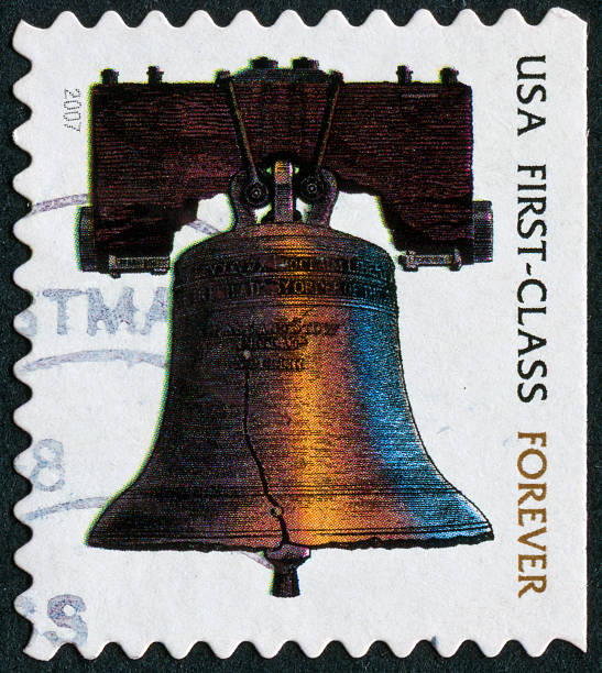 Liberty Bell Stamp "Cancelled Stamp From The United States Featuring The Liberty Bell From Philadelphia, Pennsylvania." eternity stock pictures, royalty-free photos & images