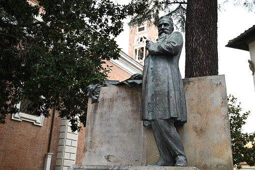 Pisa, Italy, september 18, 2023 : Statue of mathematician and senator Ulisse Dini created by Leonardo Bistolfi in the city of Pisa