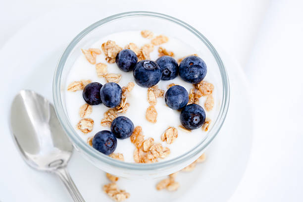 Healthy serving of yogurt with blueberries and granola