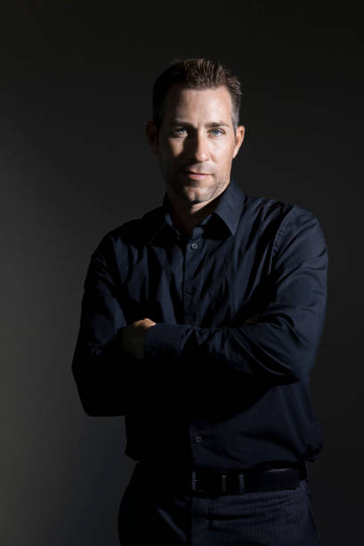 istock Handsome Man Standing with Arms Crossed 171294028