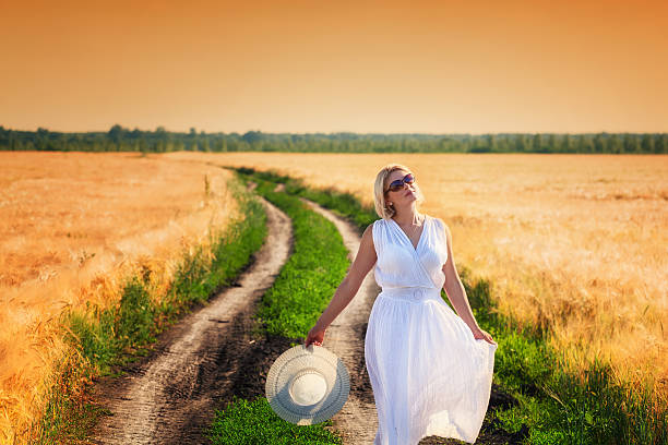 istock Woman in the wheat field 171294207