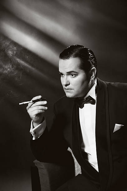 film noir style.smoking 男性 - フィルムノワールスタイル ストックフォトと画像