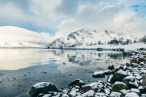Icy winter landscape in the Lofoten Archipel in Nordland, Norway during a beautiful day in winter.