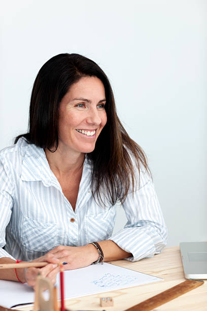 istock Woman working in her home office 171294650
