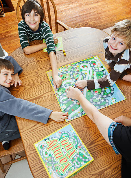 istock Family Playing A Board Game Together 171294665