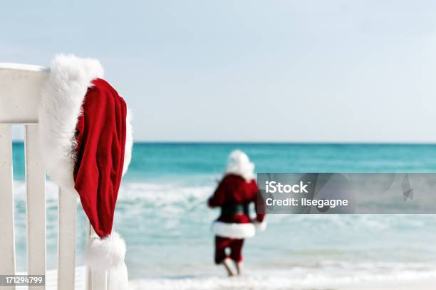 Santa In Vacations Stock Photo - Download Image Now - Beach, Santa Claus, Christmas