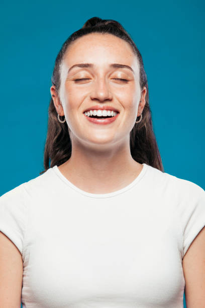 istock Happy young woman in studio 1712949189