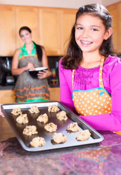 istock Mother and Daughter making cookies 171295022