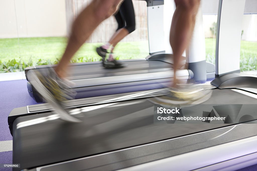 Running Running on treadmill, blurred motion, Canon 1D mark III Blurred Motion Stock Photo