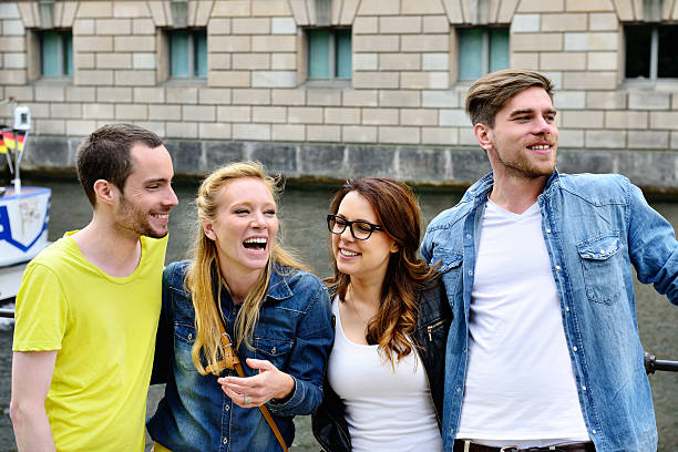 istock Four young adults hanging out, having fun 171296225