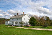 White wooden New England farmhouse