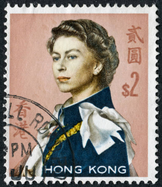 Queen Elizabeth II Stamp "Richmond, Virginia, USA - June 30th, 2012:  Cancelled Stamp From Hong Kong Featuring The Queen Of England, Elizabeth II." elizabeth ii photos stock pictures, royalty-free photos & images