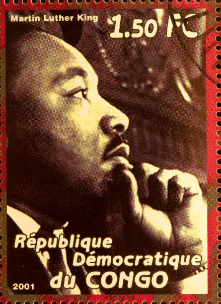 Martin Luther King "Newcastle, United Kingdom - September 18, 2012: Martin Luther King featured on a stamp from The Republique du Congo in 2001" martin luther king jr images stock pictures, royalty-free photos & images