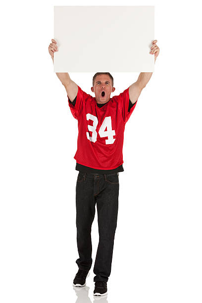 istock Sportsman holding up a placard 171297095