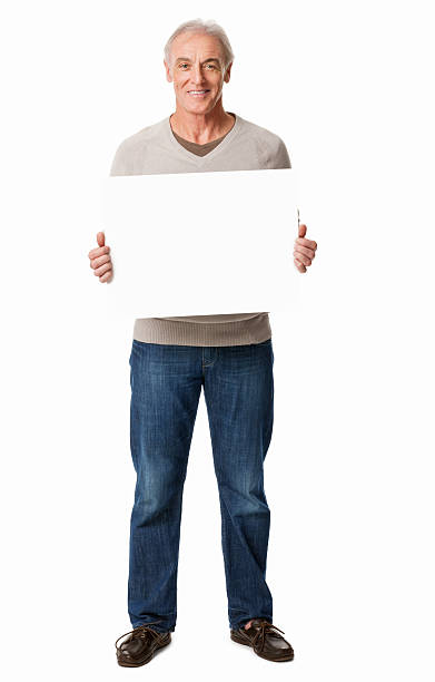 hombre sostiene un cartel en blanco aislado - man holding a sign fotografías e imágenes de stock