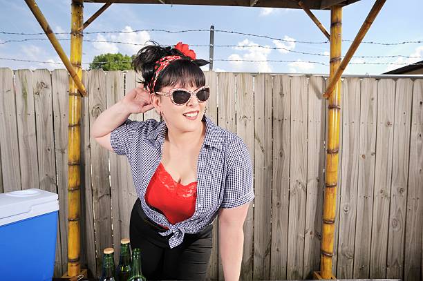 istock Flirty Curvaceous Rockabilly Woman at Barbecue 171297309
