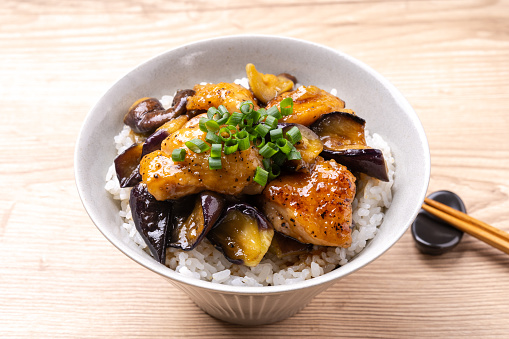 Sweet and sour stir-fried chicken and eggplant bowl